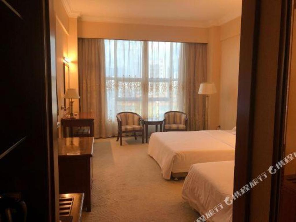 Fenggang Gladden Hotel Tiantangwei Exterior photo