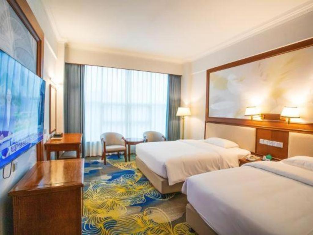 Fenggang Gladden Hotel Tiantangwei Exterior photo