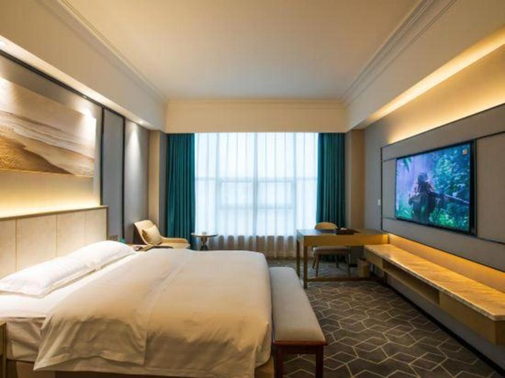 Fenggang Gladden Hotel Tiantangwei Exterior photo
