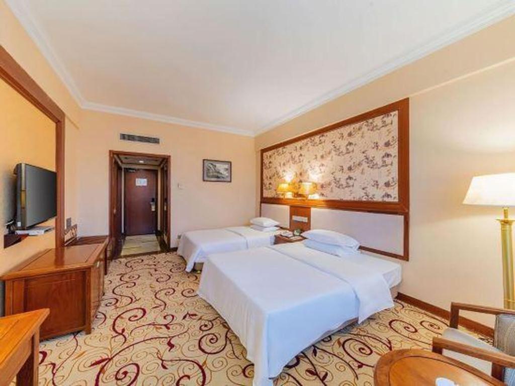 Fenggang Gladden Hotel Tiantangwei Exterior photo