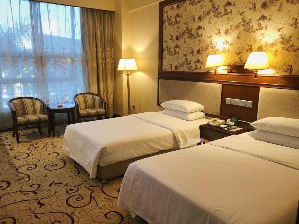 Fenggang Gladden Hotel Tiantangwei Exterior photo