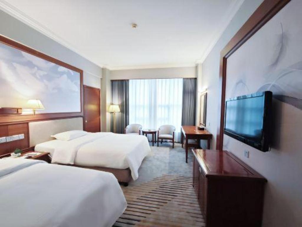 Fenggang Gladden Hotel Tiantangwei Exterior photo