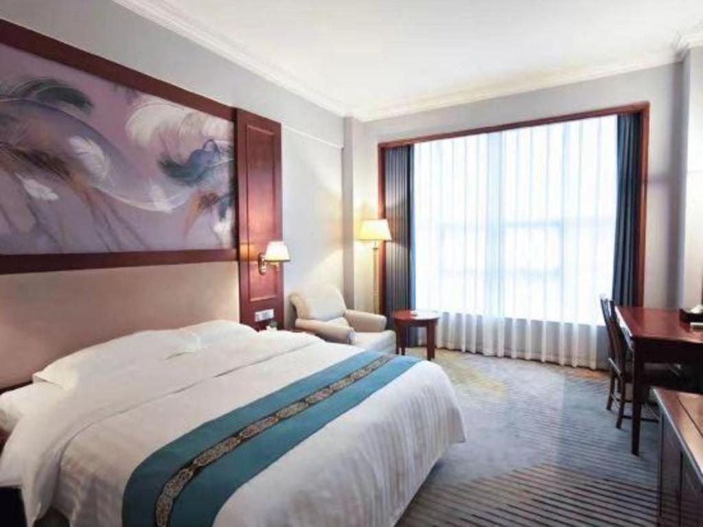 Fenggang Gladden Hotel Tiantangwei Exterior photo